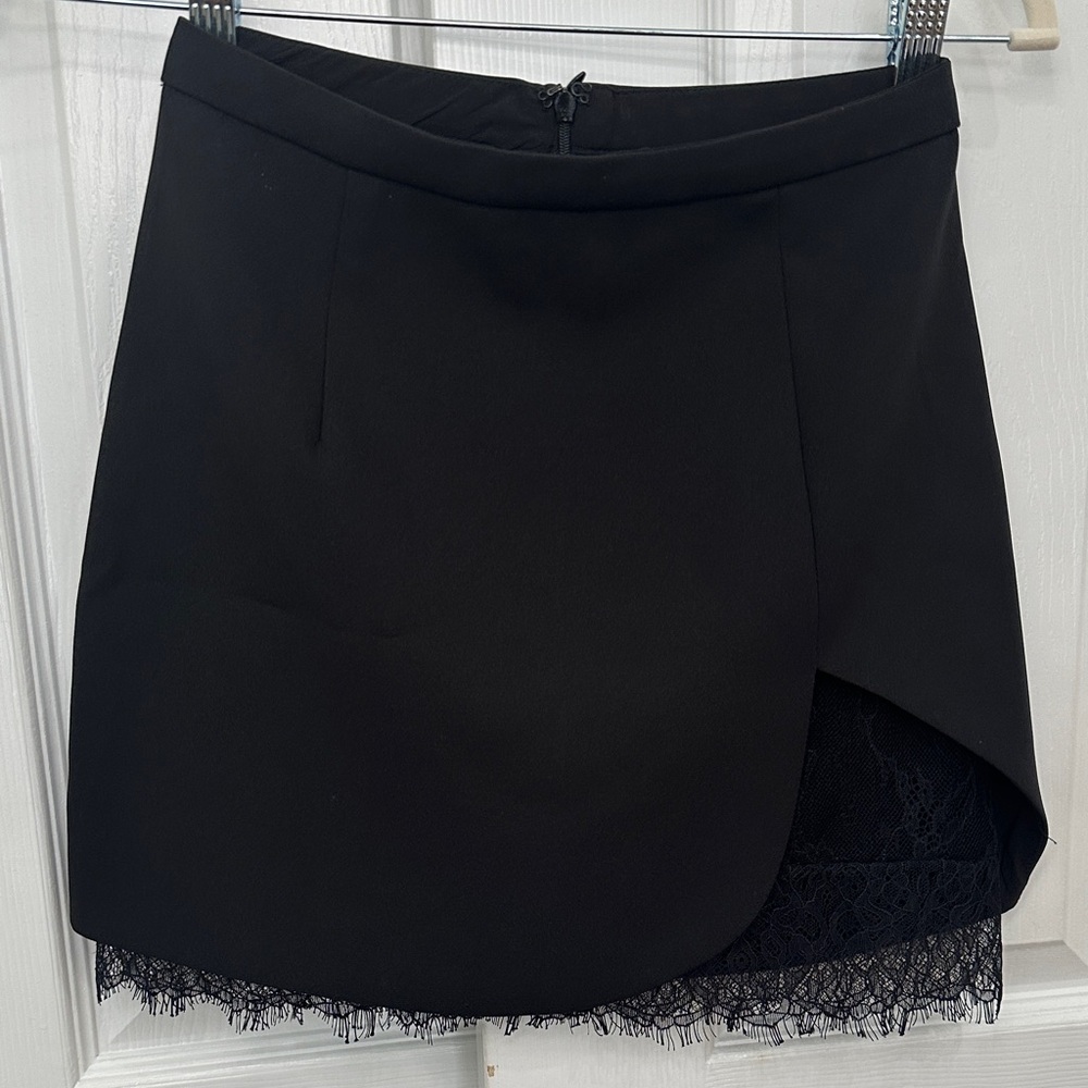NBD Black Asymmetrical Lace-Trim Mini Skirt